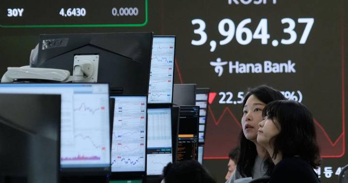Asian shares are mixed in holiday-thinned trading with Wall Street closed for Thanksgiving