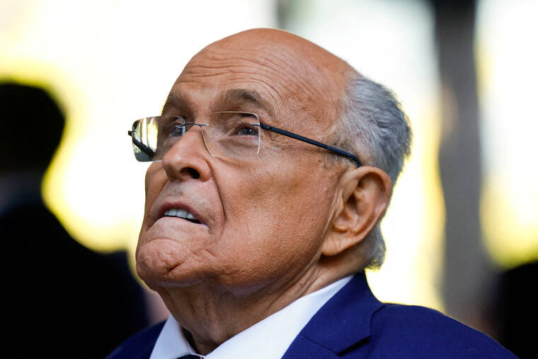 Trump pardons Giuliani, others accused of seeking to overturn his 2020 defeat