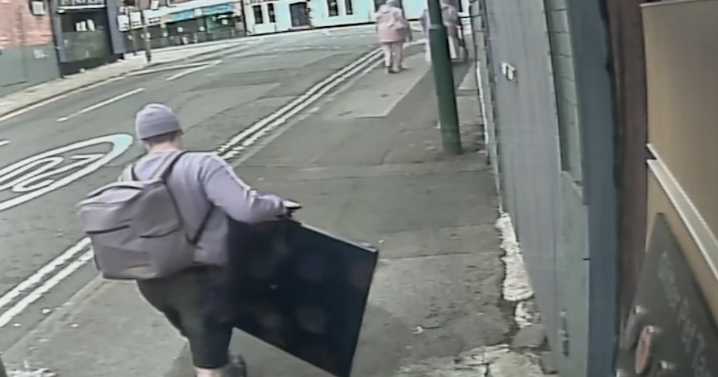 Burglar caught red-handed carrying stolen TV down Nottingham street in broad daylight