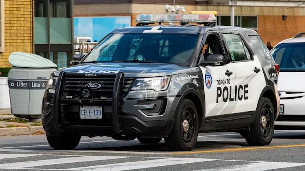 Video captures Toronto police vehicle running over suspect, arresting officer on weekend