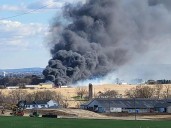 Barn fire at Herr’s Fruit Farm consumed 4 acres of field and storage containers
