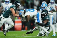 Super Bowl champs put clamps on Lions’ offense, Eagles prevail