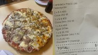 Fue a Güerrín, pidió una pizza mitad atún con cebolla y provolone y cuatro bebidas: mostró el ticket final