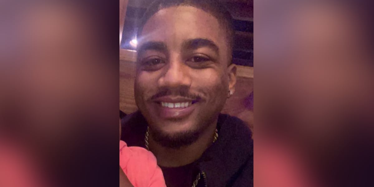 Community gathers for vigil honoring slain coach, 2 weeks after shooting