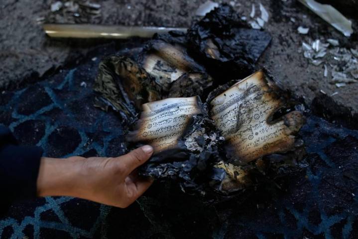 Israeli settlers torch a mosque and scrawl hateful messages