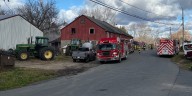 Firefighters battle barn fire in North Canaan