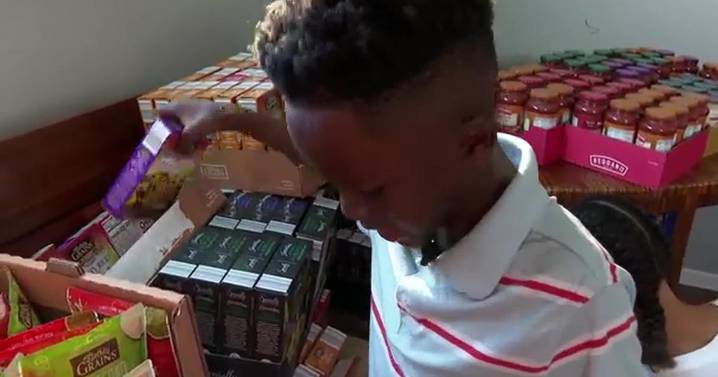 Boy holds food drive, grocery giveaway for his 8th birthday