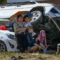 Philippines halts search for typhoon dead as huge new storm nears