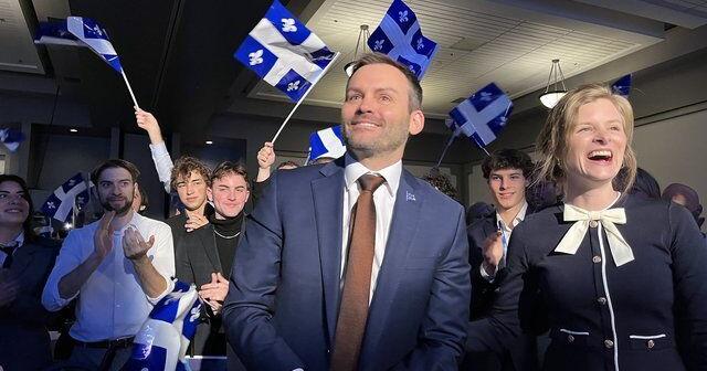 PQ leader rallies troops as Quebec Liberals warn against Quebec currency policy