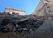 Colapsa barda y cae en vivienda contigua, en Parral