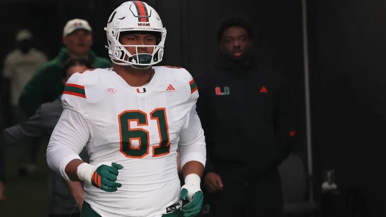 Miami's 335-pound OT Francis Mauigoa catches lateral, runs in from 13 yards for TD vs. Syracuse