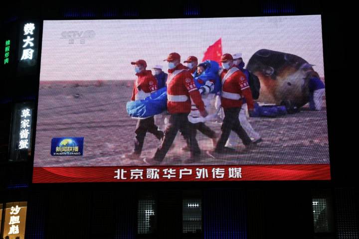 Chinese astronauts return from space station after delay blamed on space debris damage