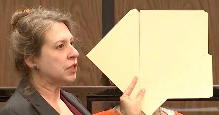 Mum hides face in court after son, 8, found dead 'in cooler filled with ice'