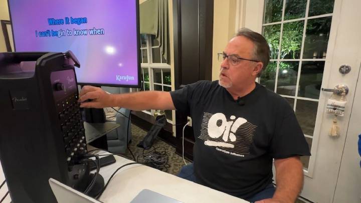 Paul Mazzapica leads Karaoke at assisted living center