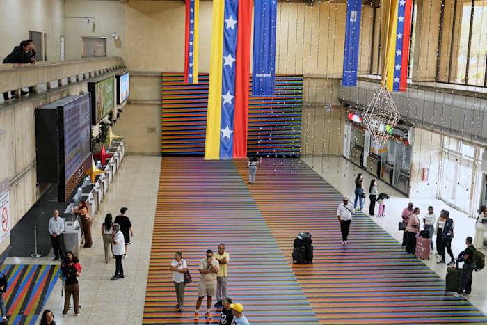 Airlines cancel flights to Venezuela after FAA warns of worsening security, military activity