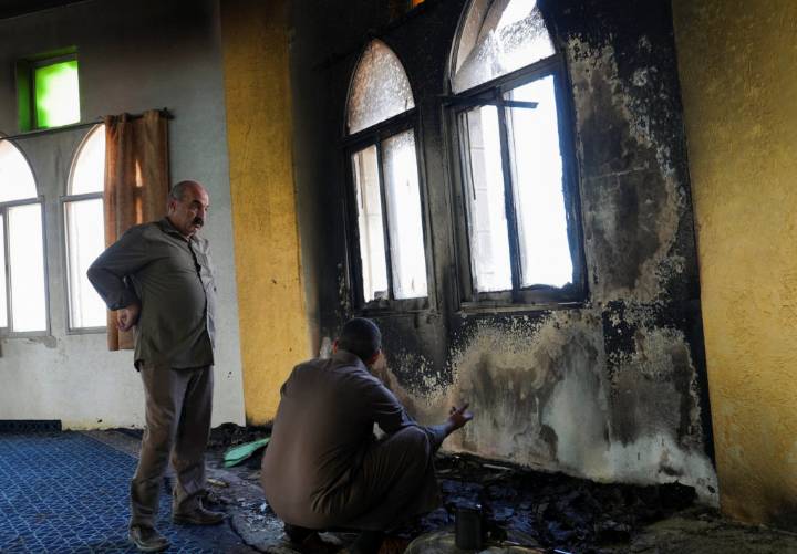 Israeli settlers torch a mosque and scrawl hateful messages despite official condemnation