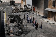 Israeli president condemns settler mob that burned Palestinian factories and vehicles