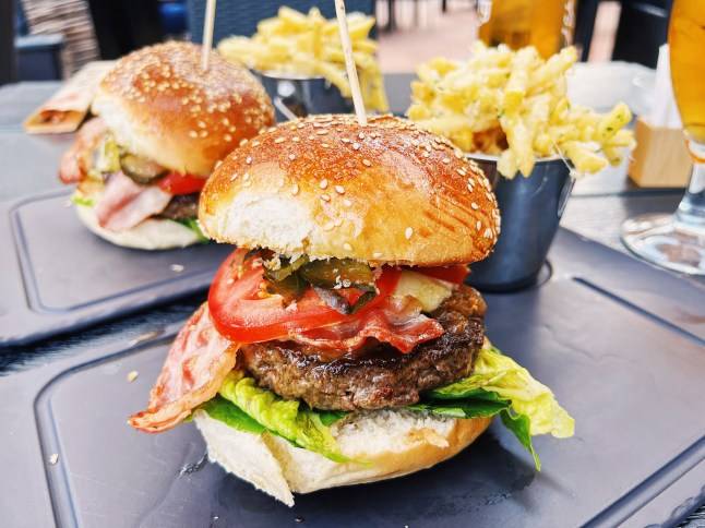 Man fighting for life after trying to eat burger without chewing