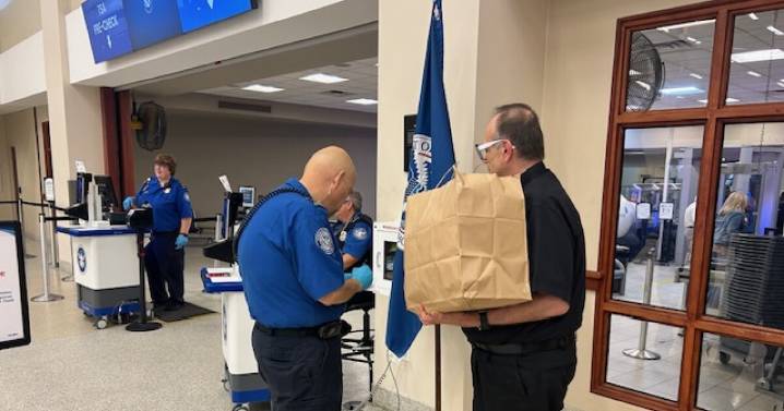 Father Jim Sichko brings meals to unpaid TSA workers during government shutdown