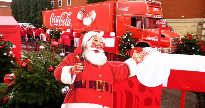 Coca Cola truck stops off at Trafford Centre as customers queue up for a glimpse