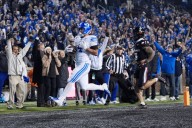 Martin rushes for 222 yards in BYU win over Cincinnati