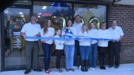Cookie Cutters Haircuts cuts ribbon in Boardman