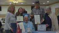 WWII veteran receives high school diploma on 99th birthday
