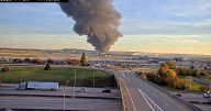 Plane crash reported near Louisville's airport as huge plume of smoke rises