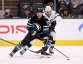 Sharks winger helped off ice after leg injury vs. Calgary Flames