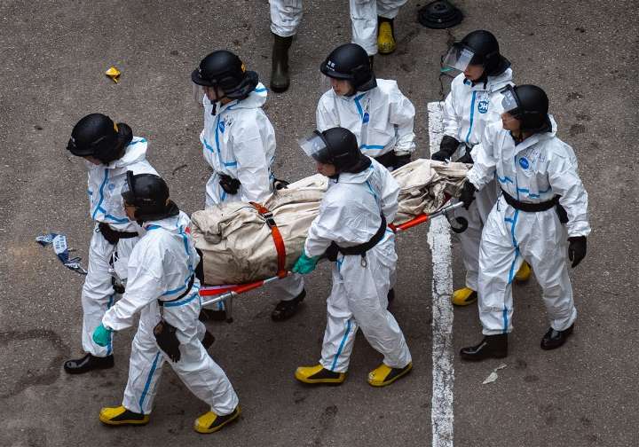 Death toll in Hong Kong apartment complex blaze rises to 146 as the city mourns