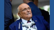 Trump pardons Rudy Giuliani and others who backed efforts to overturn 2020 election, official says