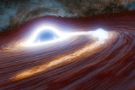 Scientists observe record-breaking flare from distant supermassiv...
