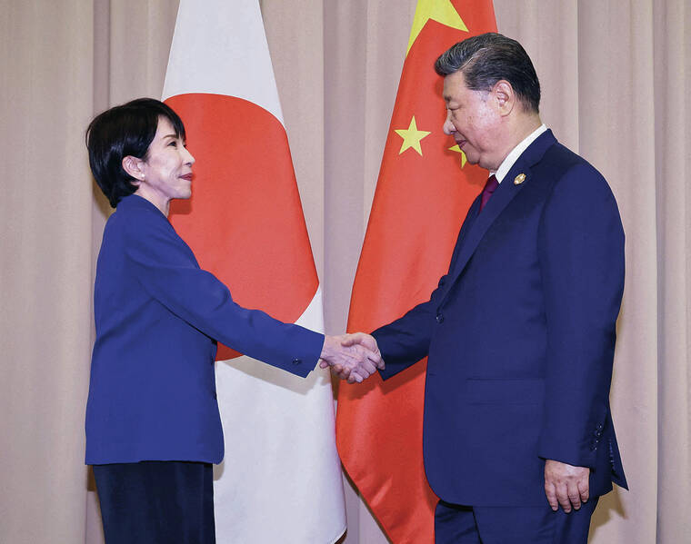 Trump urges Japan leader to avoid escalation in China dispute