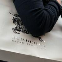 Burberry narrows first half loss on turnaround plan