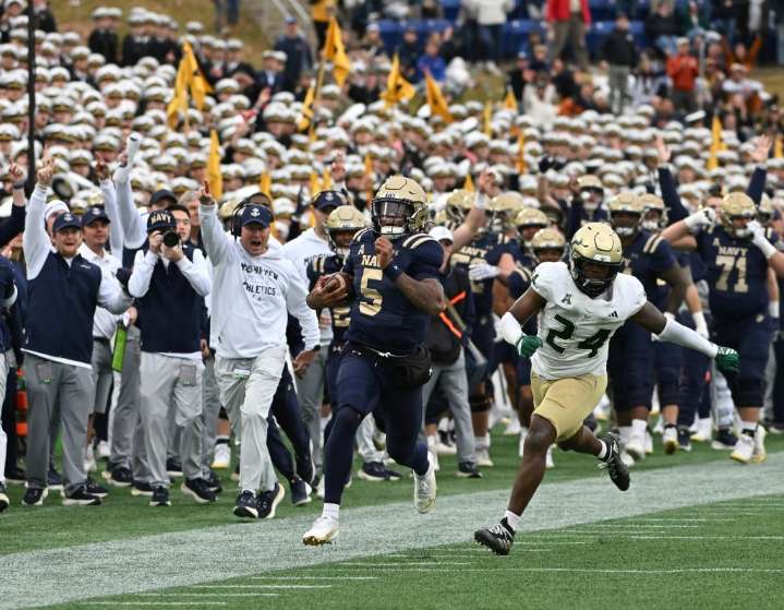 Navy QB Braxton Woodson comes to the rescue in pivotal win