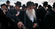 Photos of Hasidic Jewish rabbis praying at resting place of 'the Rebbe' in New York
