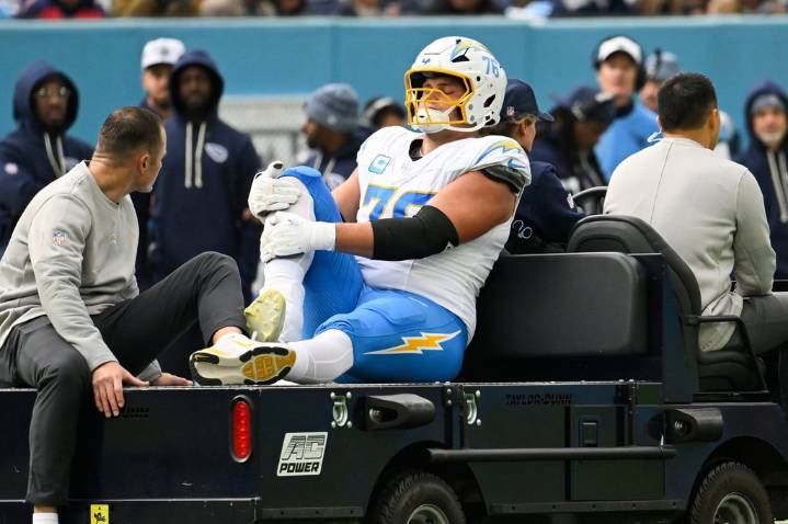 Chargers’ Joe Alt carted off field with ankle injury against Titans