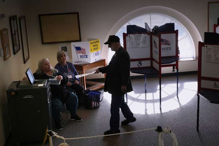 Maine voters reject new Republican-backed voter ID requirement, absentee voting changes