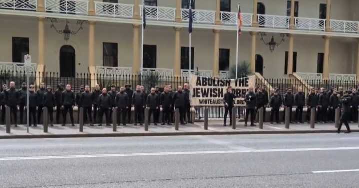 Fresh calls for tougher laws after 'disgraceful' mistake allows neo-Nazis to protest outside of state parliament