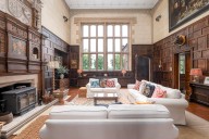 A Tudor Revival home built by a Victorian adventurer, with beauty, grandeur and its own putting green