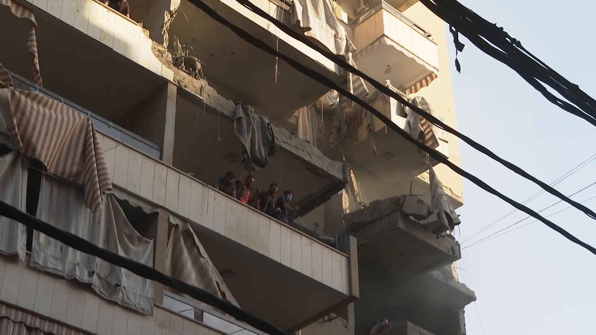 Buildings damaged as Israel says it targeted Hezbollah militant in first attack in Beirut in months