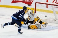 Comrie makes 28 saves, Lambert scores 1st NHL goal as Jets top Penguins
