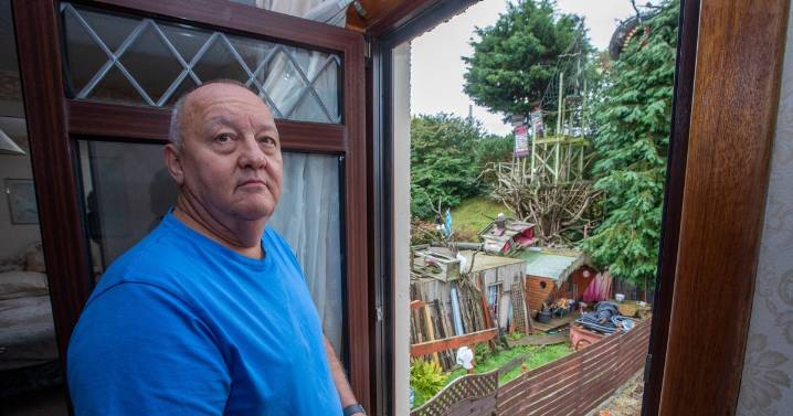 Scottish neighbours blast 'eyesore' garden as they are dealt major legal blow