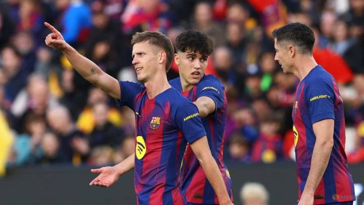 Olmo scores twice as Barca fight back to beat Alaves 3