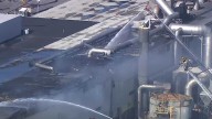 Fire at facility in Southeast Baltimore contained but not under control