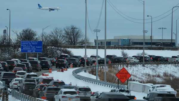Upper Midwest Thanksgiving travelers thwarted by hundreds of canceled flights, highways closed by foot of snow
