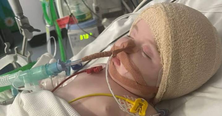 Baby diagnosed with brain tumour celebrates first birthday cancer free