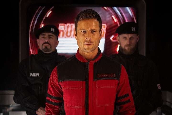 The Running Man: Glen Powell remake updates the movie for the “Eat the Rich” era.