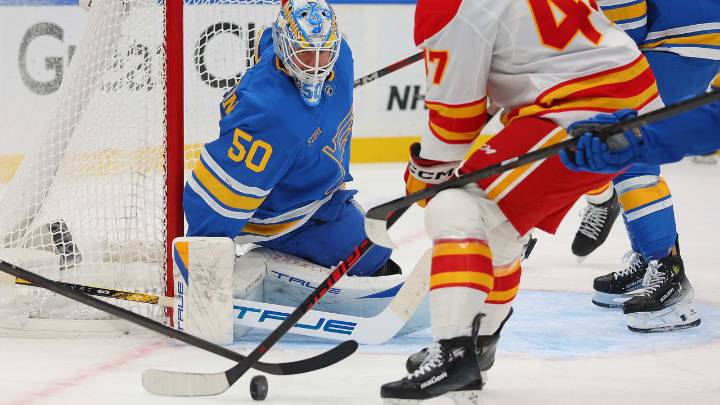 Binnington makes 38 saves, Blues edge Flames