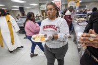 Diners find comfort among strangers at a shared Thanksgiving meal in Springfield